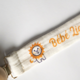 Attache Tétine Lion en tissu, double gaze de coton.